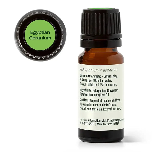 Egyptian geranium essential oil bottle with ingredient and usage label, aromatherapy product