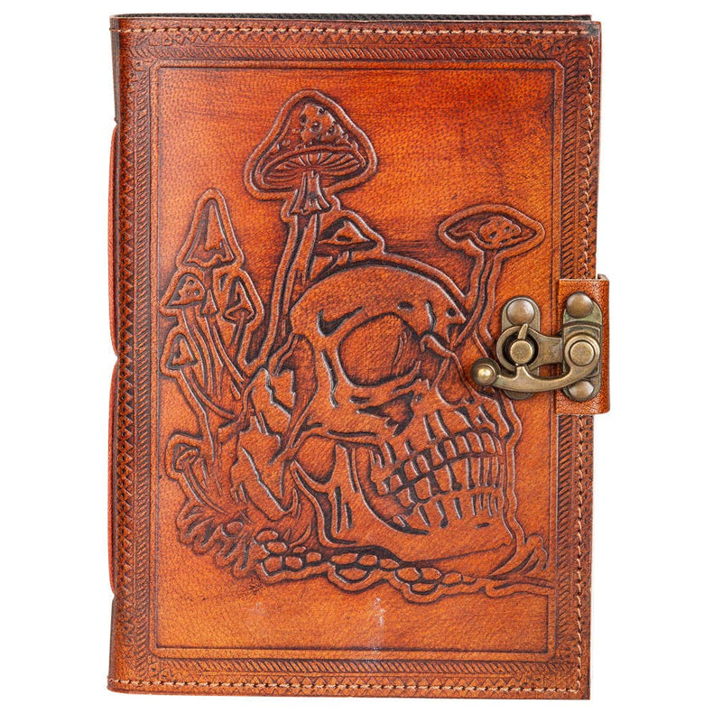 Brown leather journal with skull and mushroom embossing, metal clasp closure, gothic style