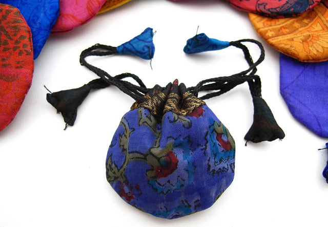 Colorful fabric drawstring pouch with floral pattern, perfect for crystals or tarot cards