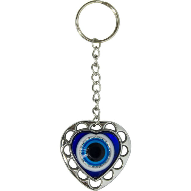 Heart-shaped evil eye keychain with blue and white concentric circles, silver filigree frame, and chain