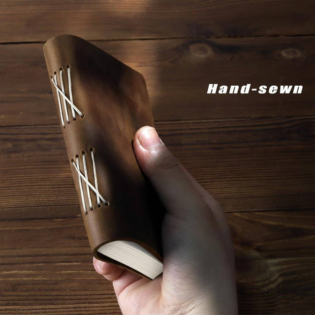 Hand-sewn leather journal with rustic binding, perfect for tarot notes or spiritual practice