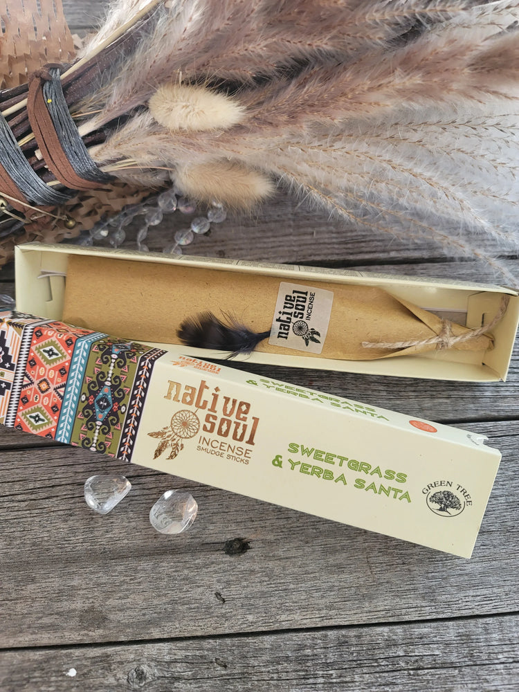 Native Soul Sweetgrass & Yerba Santa incense box with feathers, crystals, and dried grass bouquet on rustic wood