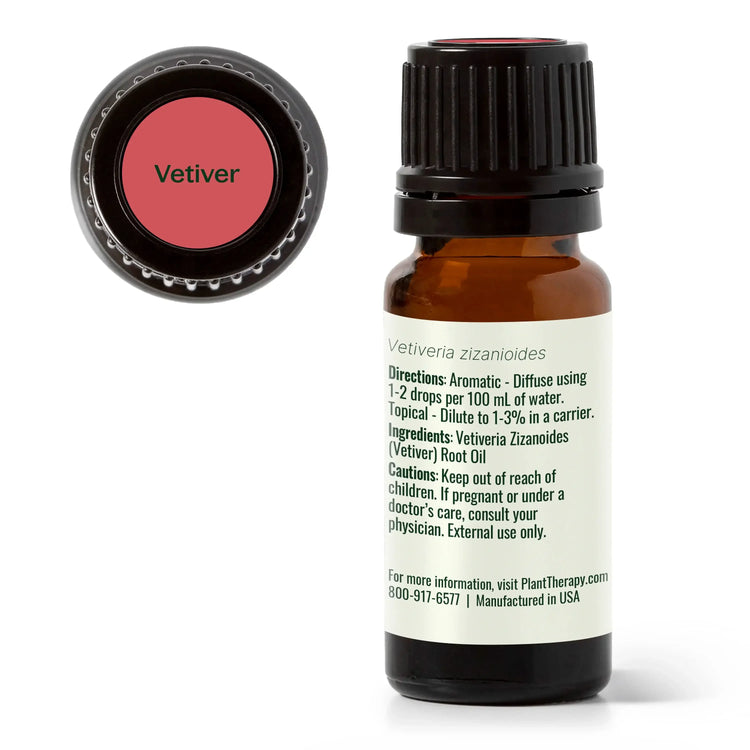 Vetiver essential oil bottle with label details and black cap, natural aromatherapy product