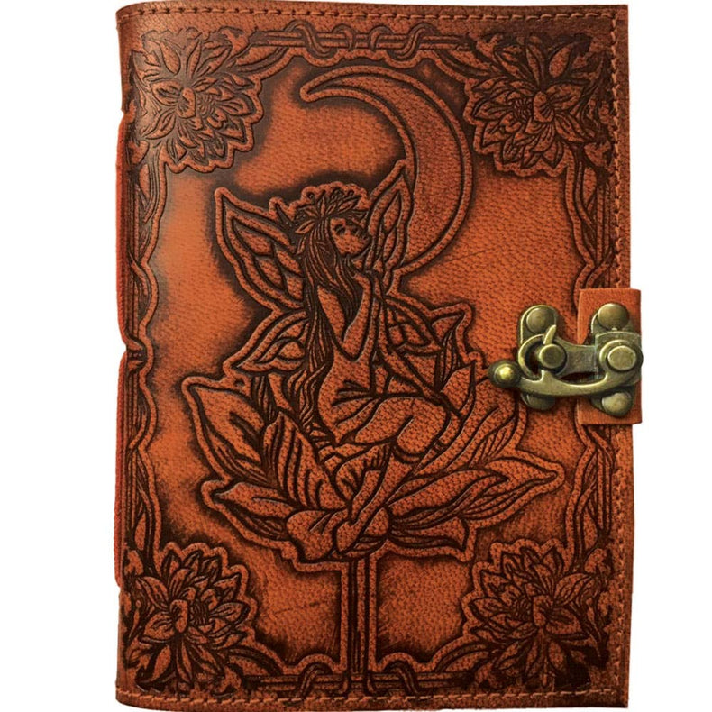 Leather journal with embossed fairy, crescent moon, lotus flower, and brass latch