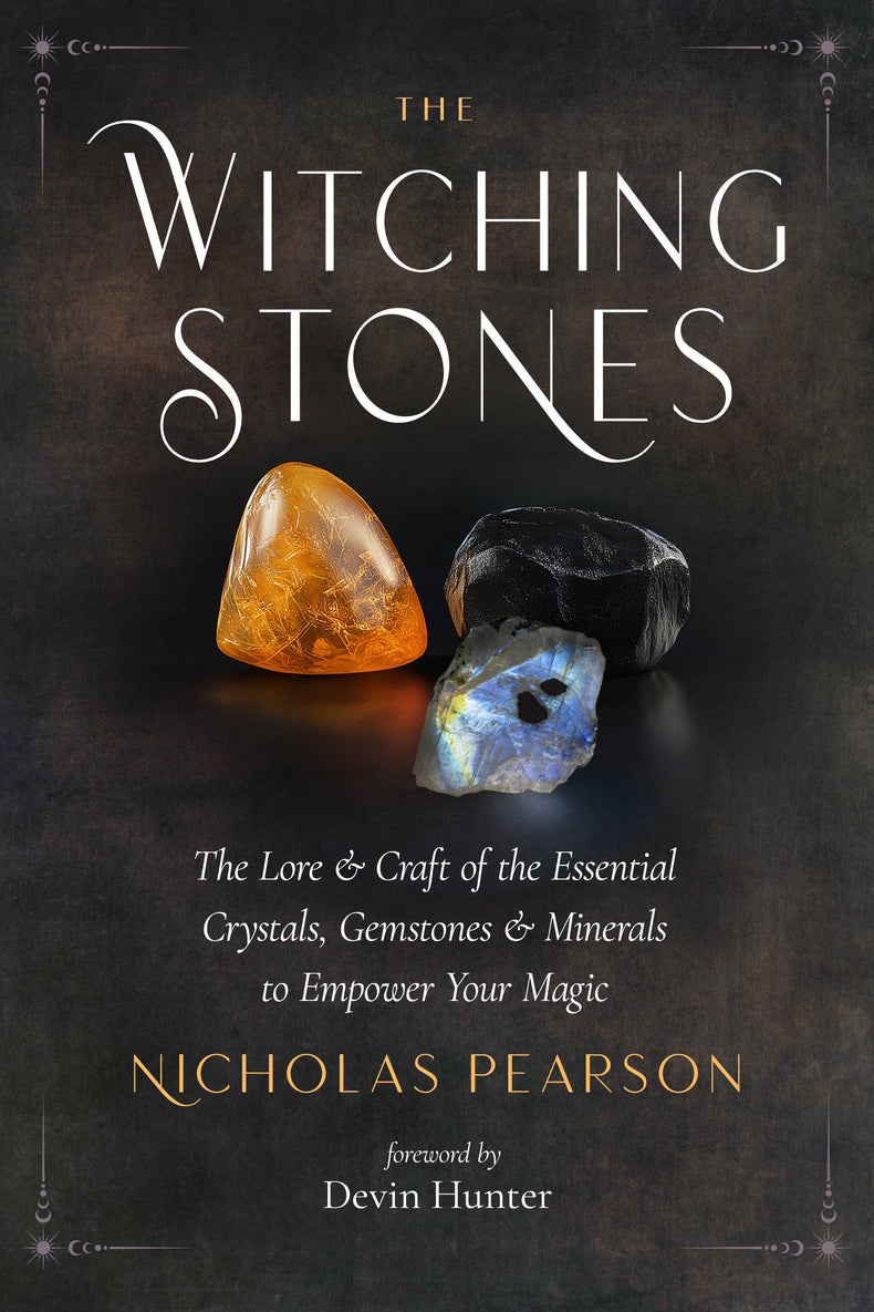 Book cover with orange, black, and blue crystals, titled 'The Witching Stones'.