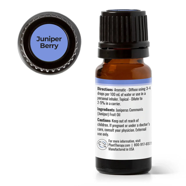 Juniper Berry essential oil bottle with dropper cap and product label instructions