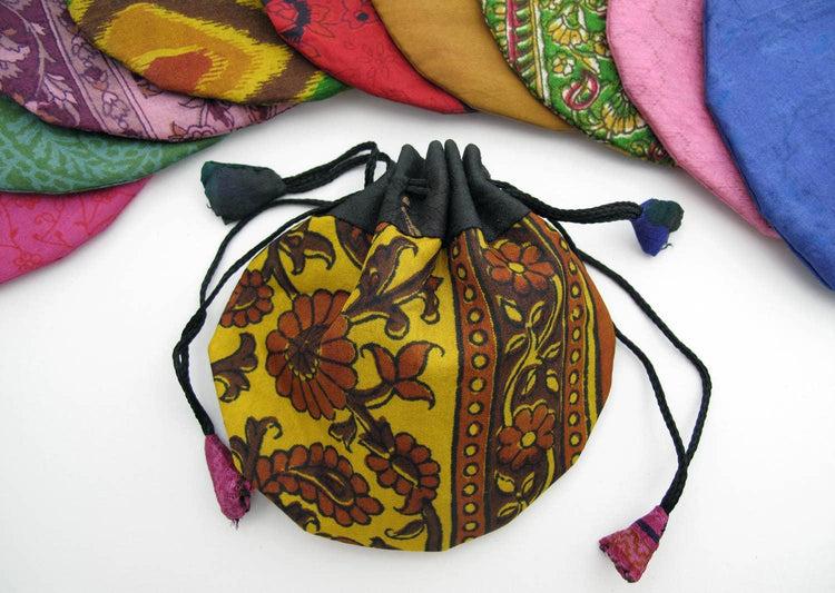 Colorful fabric drawstring pouch with floral pattern, perfect for tarot cards or crystals storage