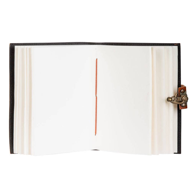 Open blank journal with vintage brass clasp and stitched binding, perfect for writing or sketching