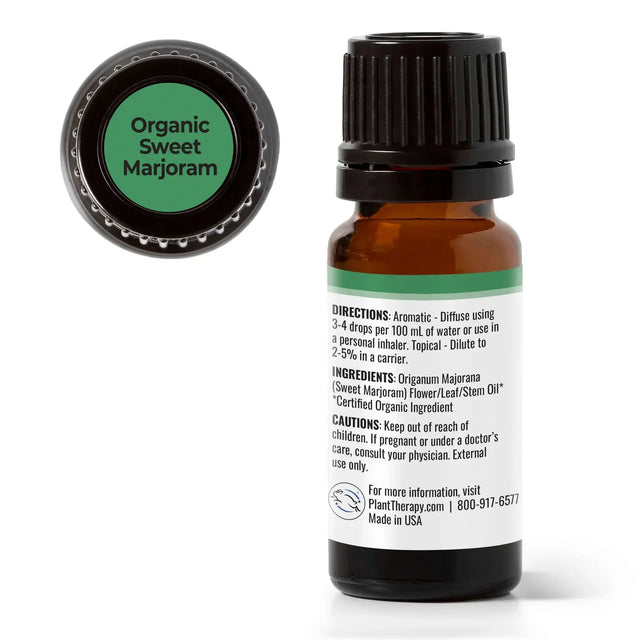 Organic sweet marjoram essential oil bottle with ingredient and usage label visible