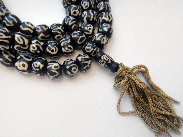 Carved Bone Mala- Batik Om