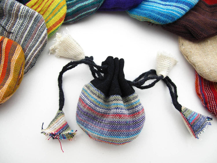 Colorful woven drawstring pouch for crystals or tarot accessories on white background