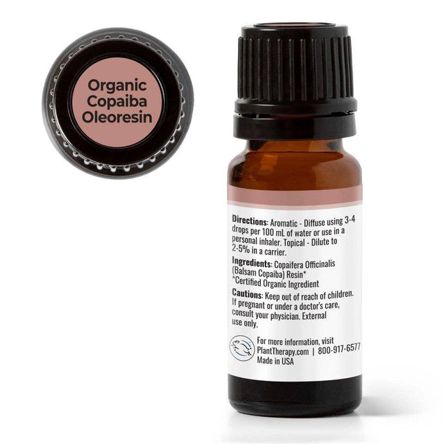 Organic Copaiba Oleoresin essential oil bottle with product label and black cap