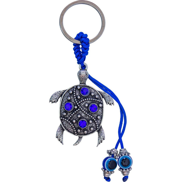 Turtle keychain with blue evil eye beads and purple gemstones, spiritual protection charm