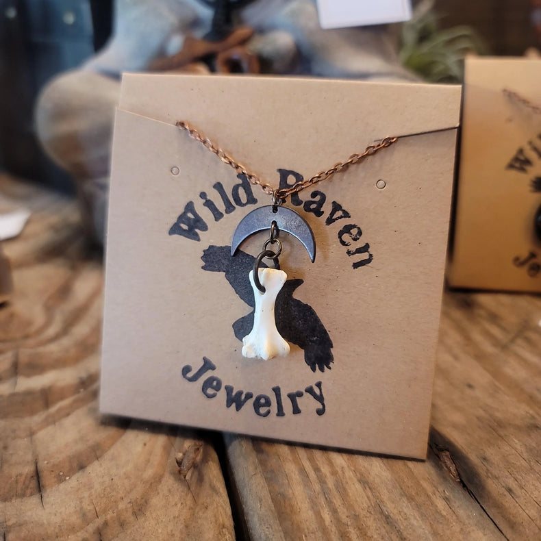 Opossum bone pendant - Wild Raven