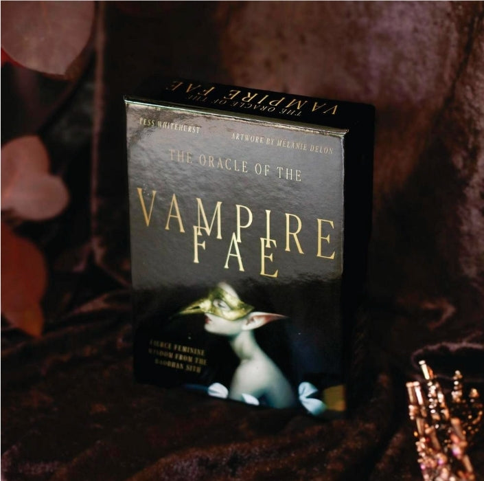Vampire Fae oracle tarot card deck with fantasy artwork on a velvet cloth background