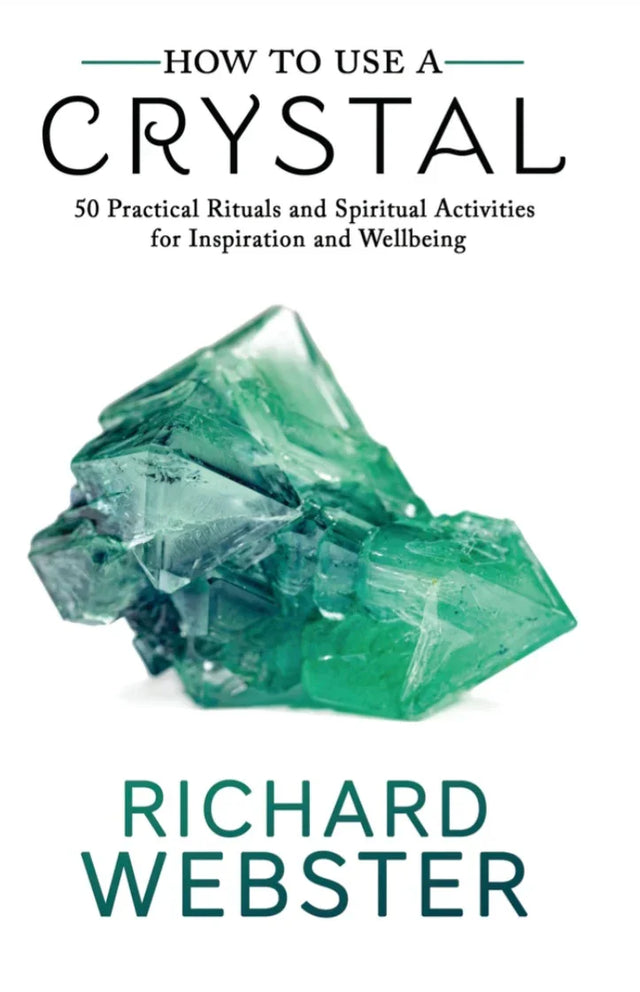 Book cover of 'How to Use a Crystal' featuring a green crystal and spiritual rituals guide.