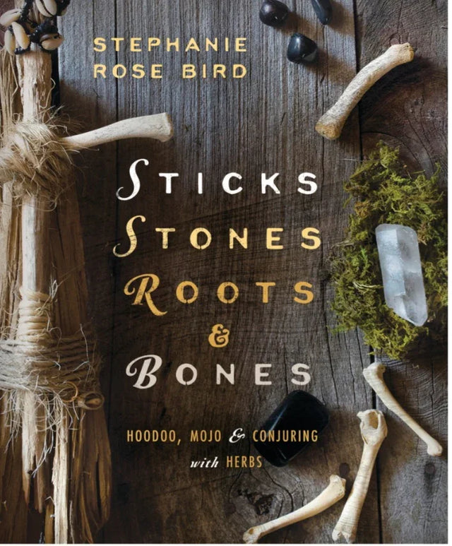 Book cover with crystals, bones, moss, and sticks for metaphysical and herbal healing.
