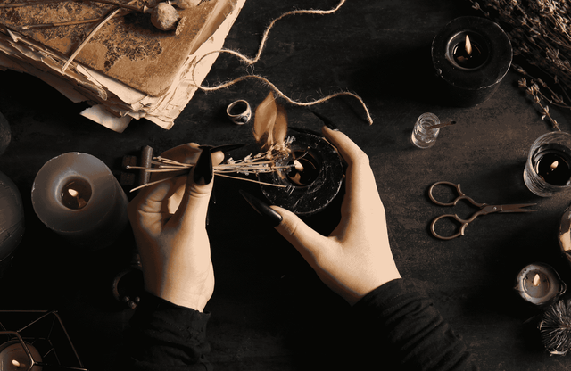 a woman burning herbs