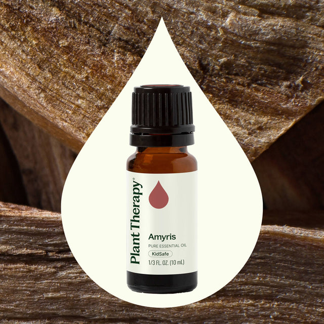 Plant Therapy Amyris pure essential oil, KidSafe, 10 mL bottle on rustic wood background