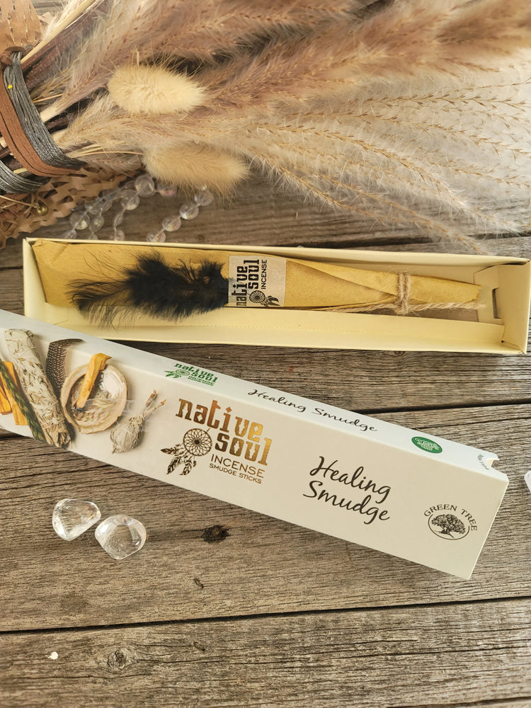 Native Soul Healing Smudge incense sticks box with feather and crystals on wooden table