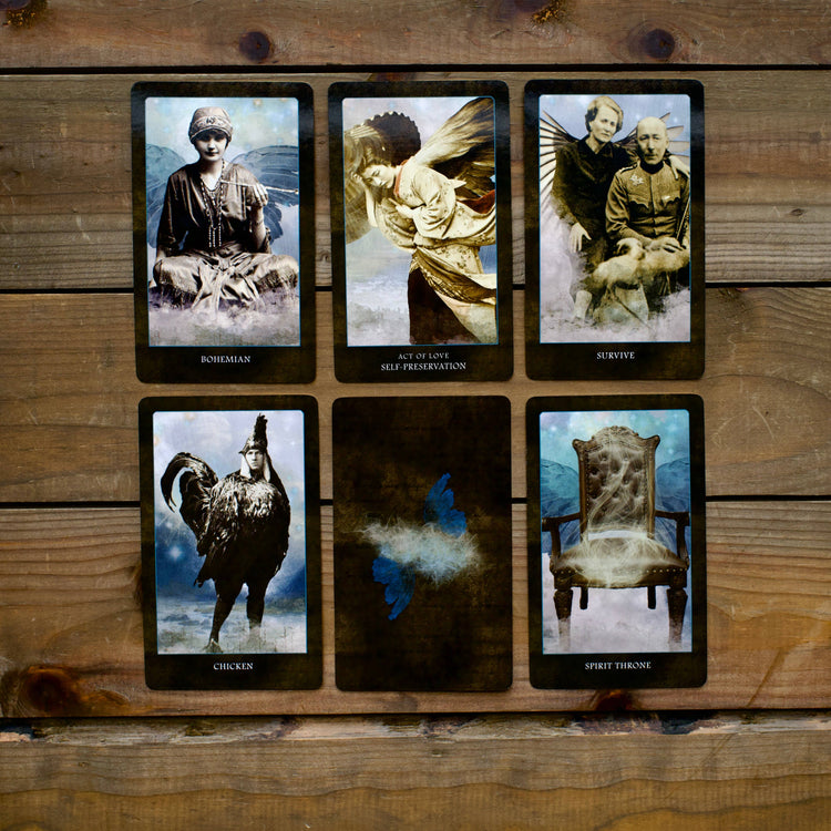 Six vintage-style tarot cards with mystical imagery displayed on a wooden surface.