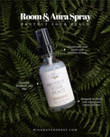 Protect Your Peace aura and room spray bottle with crystal-infused formula on green fern leaves