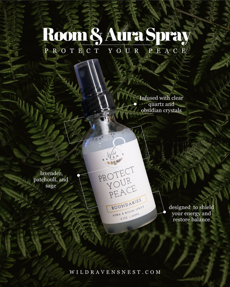 Protect Your Peace aura and room spray bottle with crystal-infused formula on green fern leaves