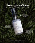 Medusa's Protection room and aura spray bottle with herbal ingredients on ferns background