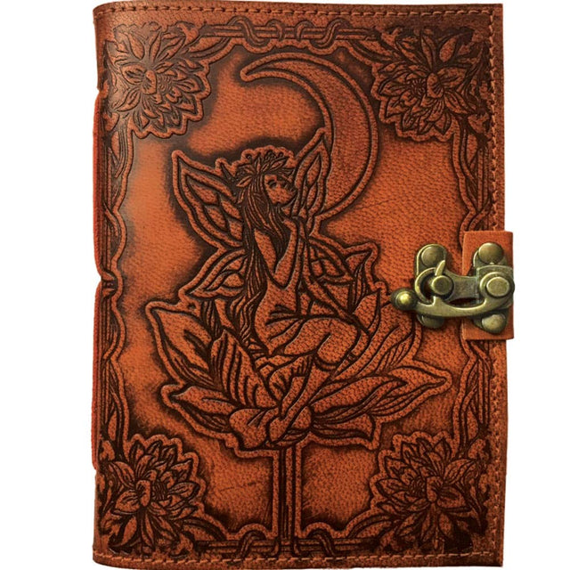 Leather journal with embossed fairy, crescent moon, lotus flower, and brass latch