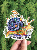 Nature Slut vinyl sticker, a snail with a galaxy shell among mushrooms