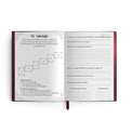 Open metaphysical journal showing tarot spread layout and self-reflection prompts for overcoming self-sabotage.