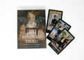 The Beloved Dead oracle deck box with three vintage-style tarot cards on white background