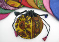 Colorful fabric drawstring pouch with floral pattern, perfect for tarot cards or crystals storage