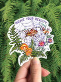 Spider Weaver vinyl sticker, an orb weaver spider in her web with ferns and a mushroom