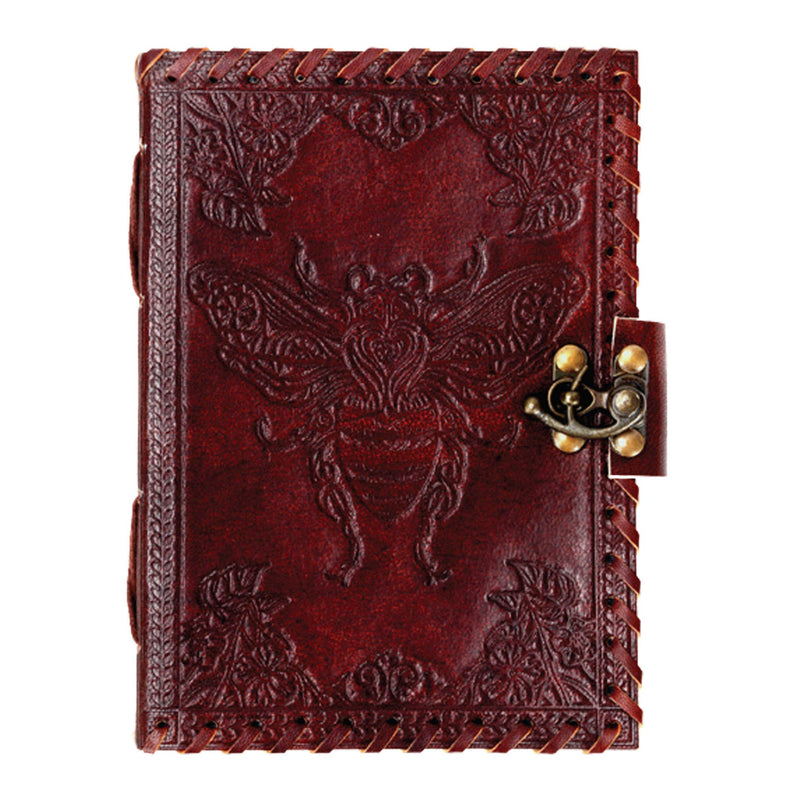 Brown leather journal with embossed bee design and metal clasp, metaphysical notebook