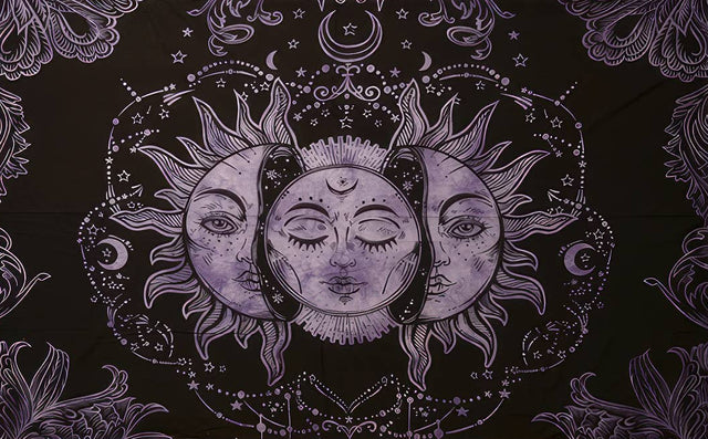 Black tapestry with a central sun and moon design, surrounded by floral patterns on a white background.