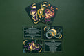 Tarot cards with colorful snake illustrations and ritual instructions on a green background