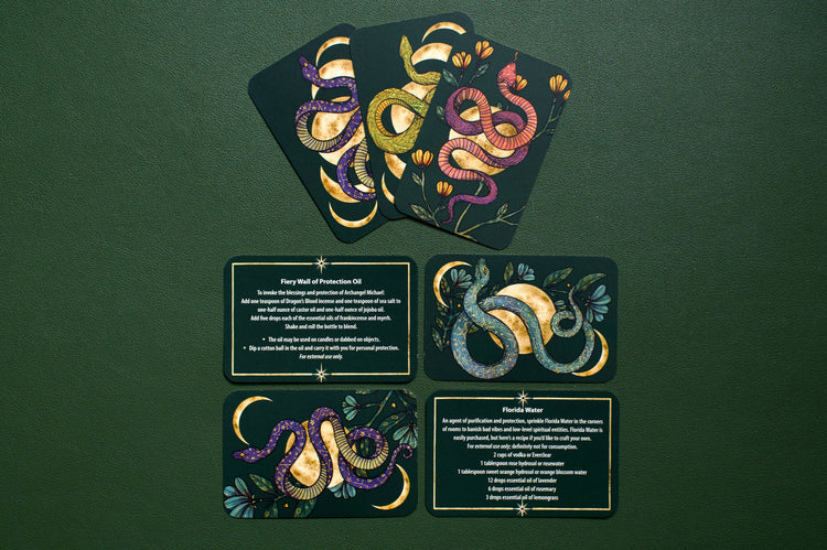 Tarot cards with colorful snake illustrations and ritual instructions on a green background