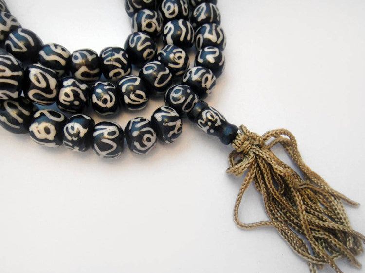 Carved Bone Mala- Batik Om