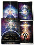 The Secret Language of Darkness tarot deck by Denise Jarvie, featuring cosmic, spiritual card art with DNA helix and chakra imagery.