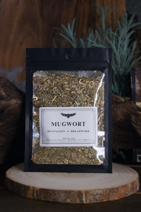 Resealable package of organic mugwort herb for divination and dreamwork on wood slice