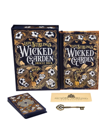 Lady Stirling's Wicked Garden Oracle Deck with ornate gold designs and a vintage key