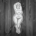 Wouldn't Change a Thing sticker shown on dark wood
