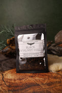 Black Walnut Hulls dried herb in a 1/2 oz Wild Raven's Nest bag, Break Attachments