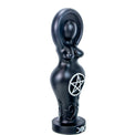 Black goddess figurine with pentacle symbol, crescent moons, and triple moon accents