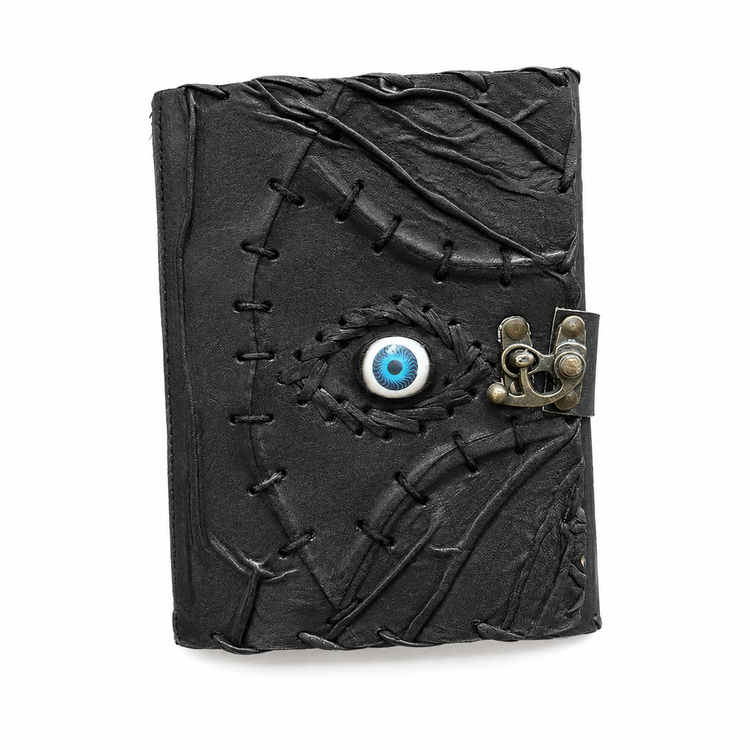 Black leather journal with blue eye emblem, hand-stitched binding, and metal clasp for tarot or spiritual journaling