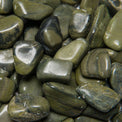 Polished green jasper tumbled stones for crystal healing and meditation