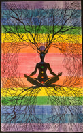 Yoga mat with a silhouette of a person meditating under a tree against a rainbow background