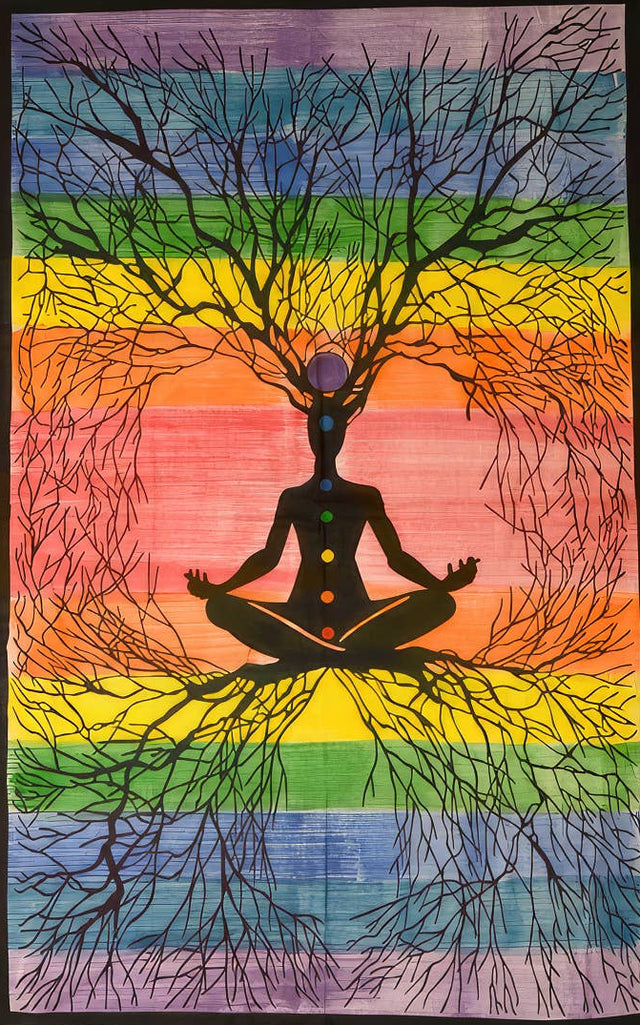 Yoga mat with a silhouette of a person meditating under a tree against a rainbow background
