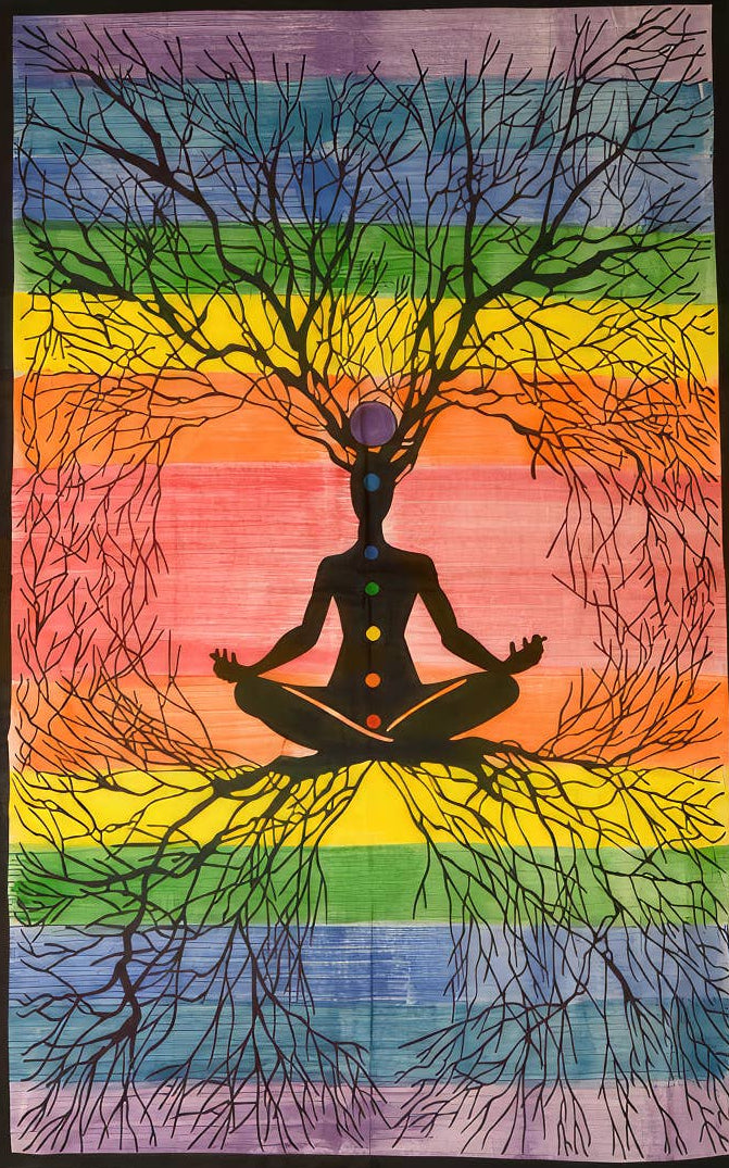 Yoga mat with a silhouette of a person meditating under a tree against a rainbow background